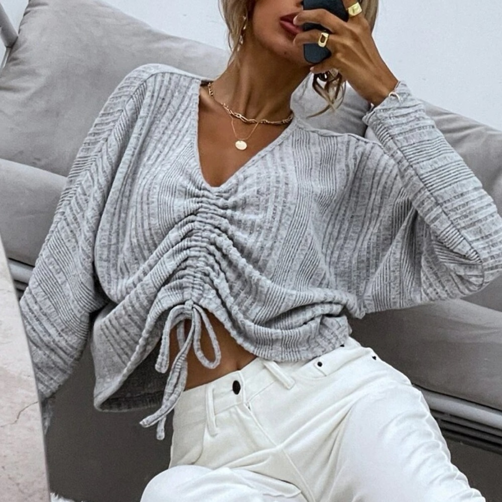 Drawstring over sized shirt.